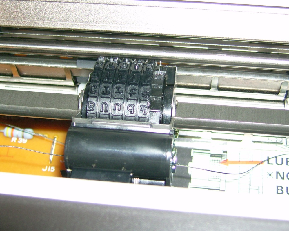 Printing element of an Atari 1027 daisy-wheel printer. image credit: MadEye Moody, public domain, WikiMedia, 